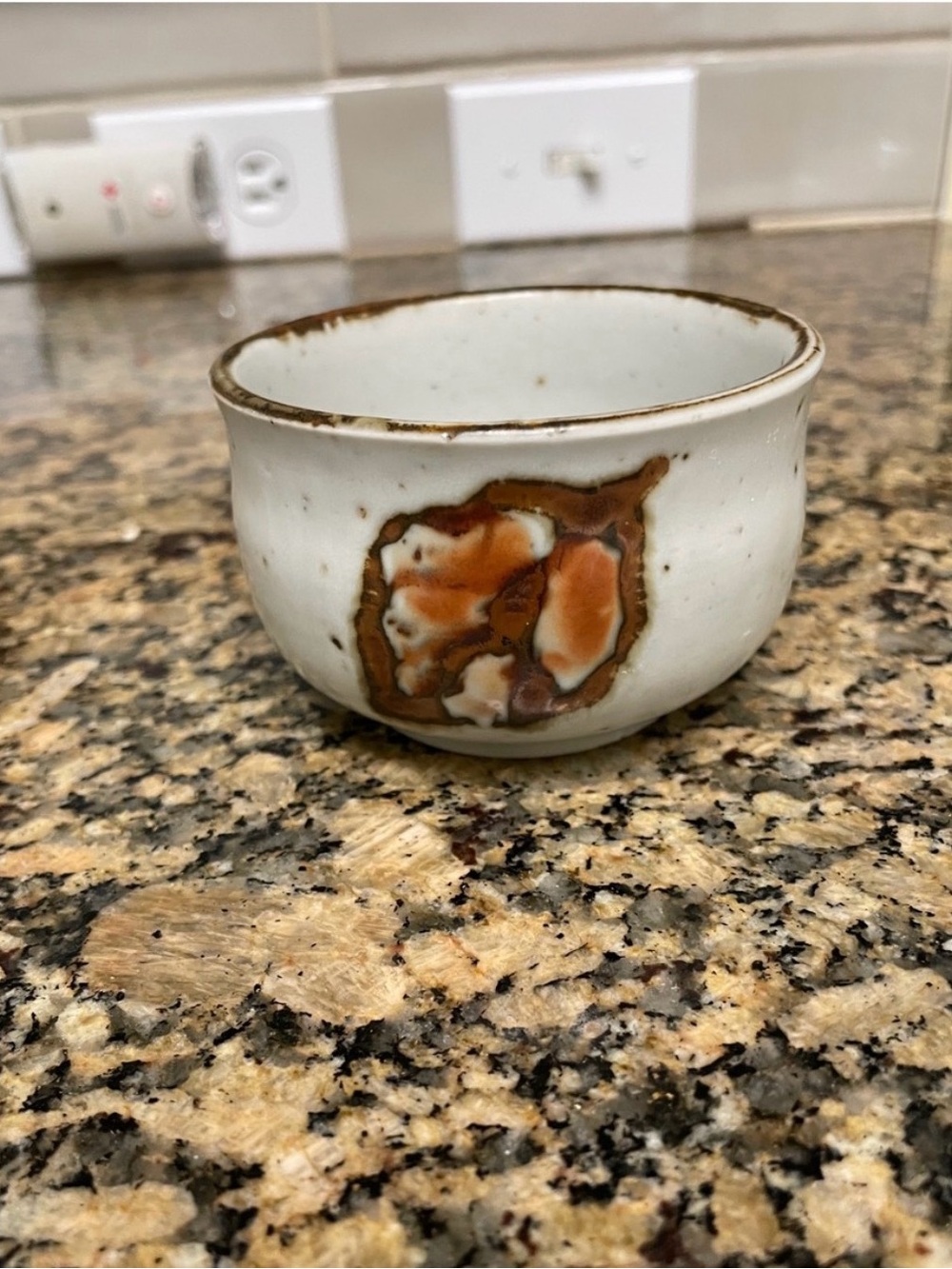 Japanese ceramic tea bowl handcrafted in the traditional Shino ware